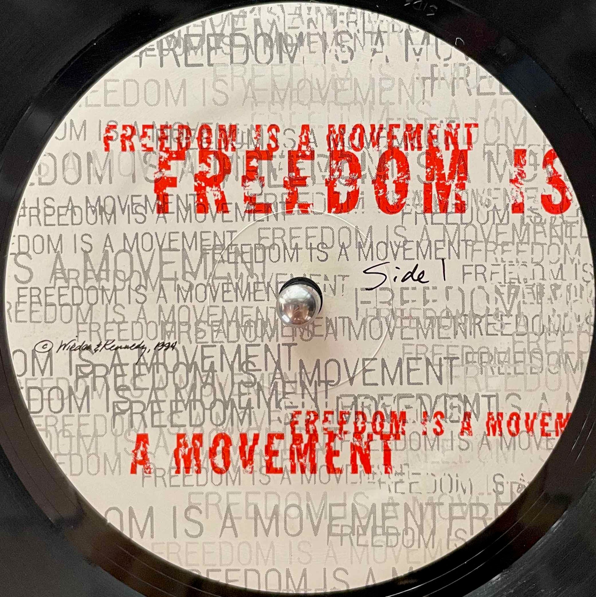 Various – Freedom Is A Movement 12 inch single Label image front